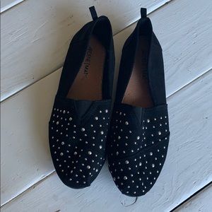 Black studded flats